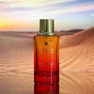 Crvena okrugla bočica parfema