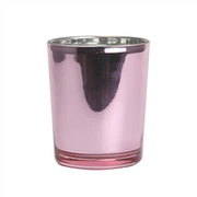 Ružičasta staklena posuda za svijeće